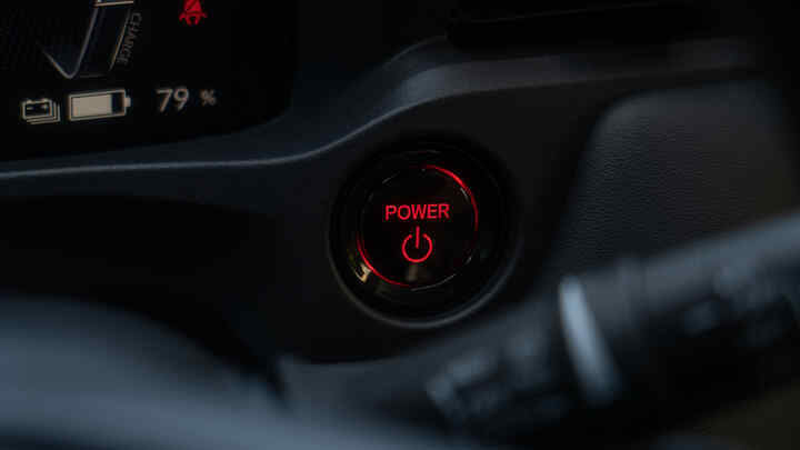 Close up of the Honda e:Ny1 ignition button.