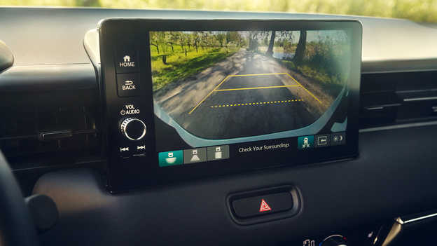 Rear view camera displaying the wide-angle view of the area directly behind on the 9” screen