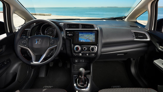 Image of Honda car interior overlooking the beach.