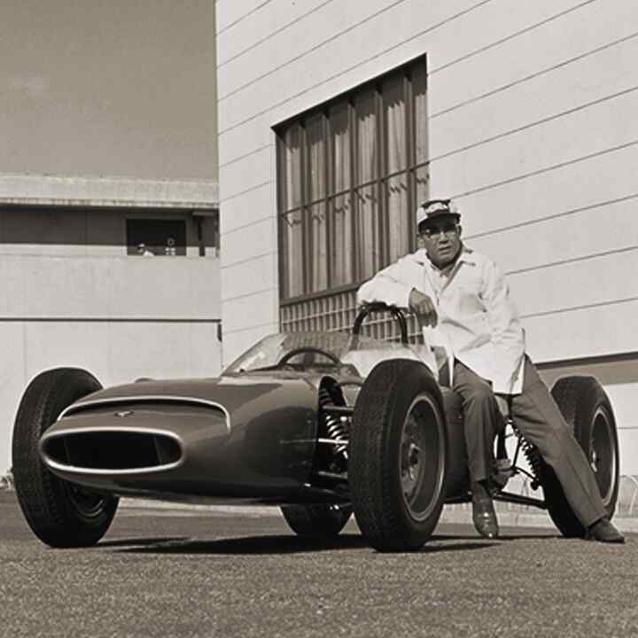 Heritage shot of Soichiro Honda with the first Formula 1 car.