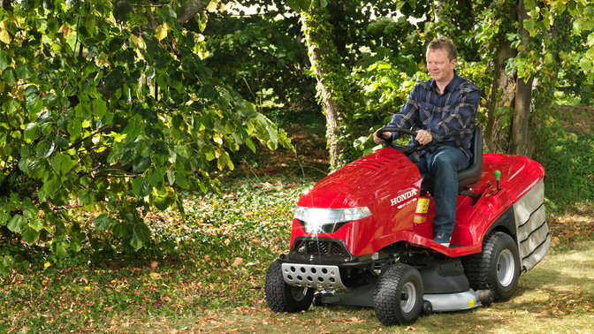Front three-quarter, left facing, being used by model, garden location.