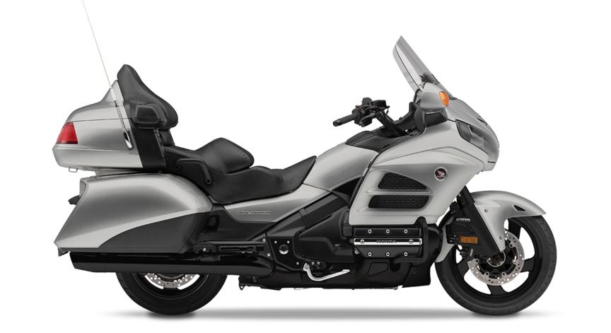 Side on, right-facing red Honda Goldwing GL1800.
