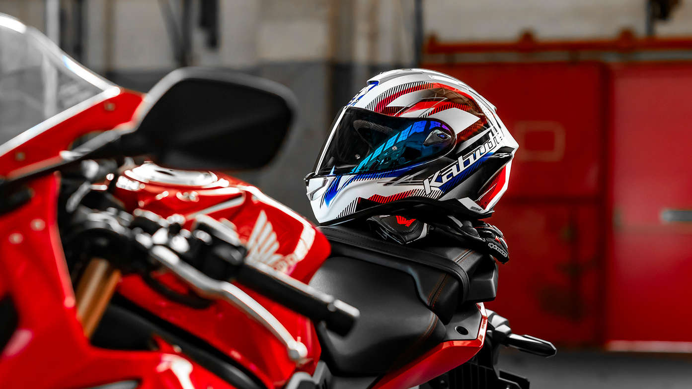 Honda Kabuto helmet, Aeroblade V, sitting on the tank of a motorcycle