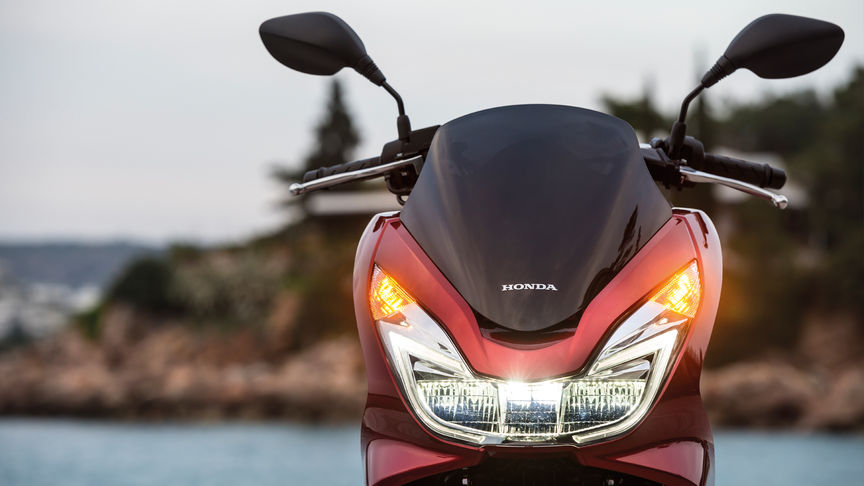 Honda scooter battery location #7