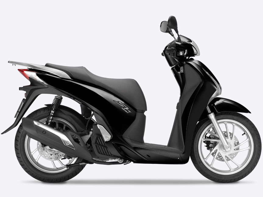 Side on, right-facing black SH125i.