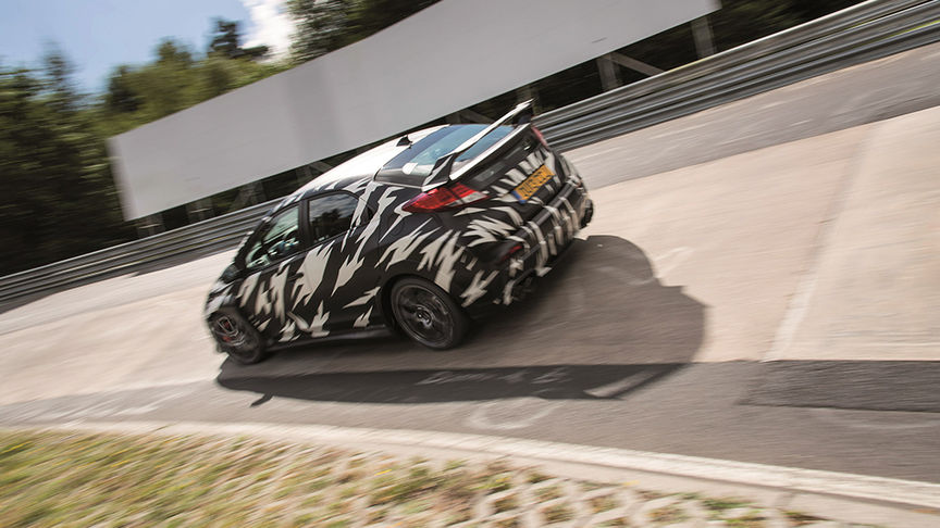 black and white patchy Type R on track