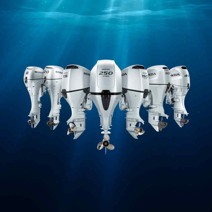 Honda marine outboard engines full range on blue ocean background