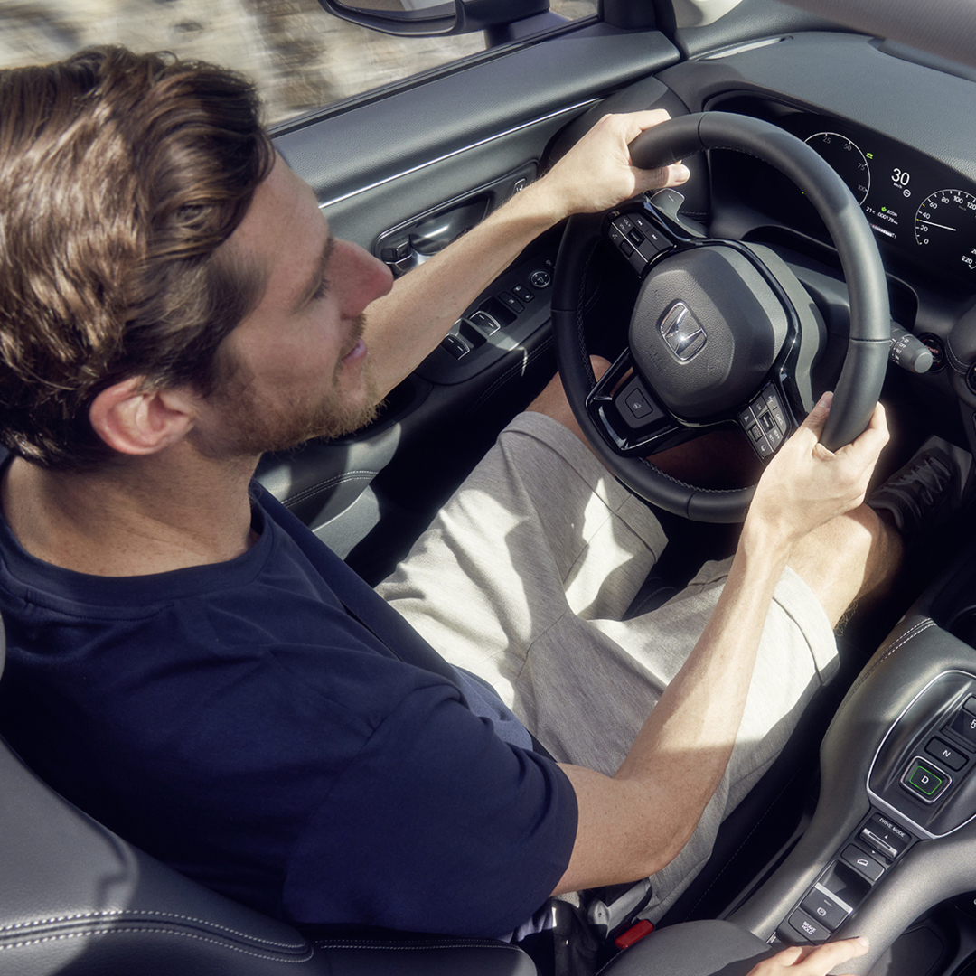 White ZR-V on a mountain road