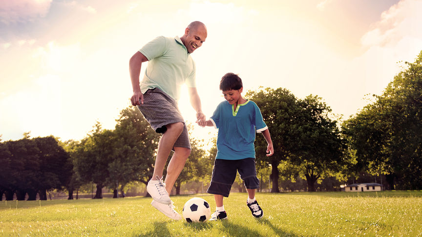 Parent and child playing