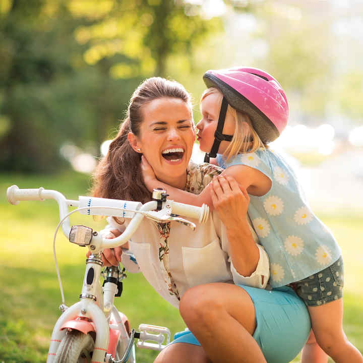 Woman and the kid sharing the road safely