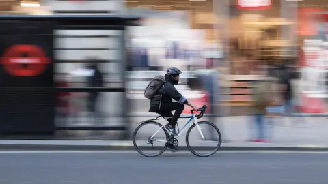 Cyclist cycling in London