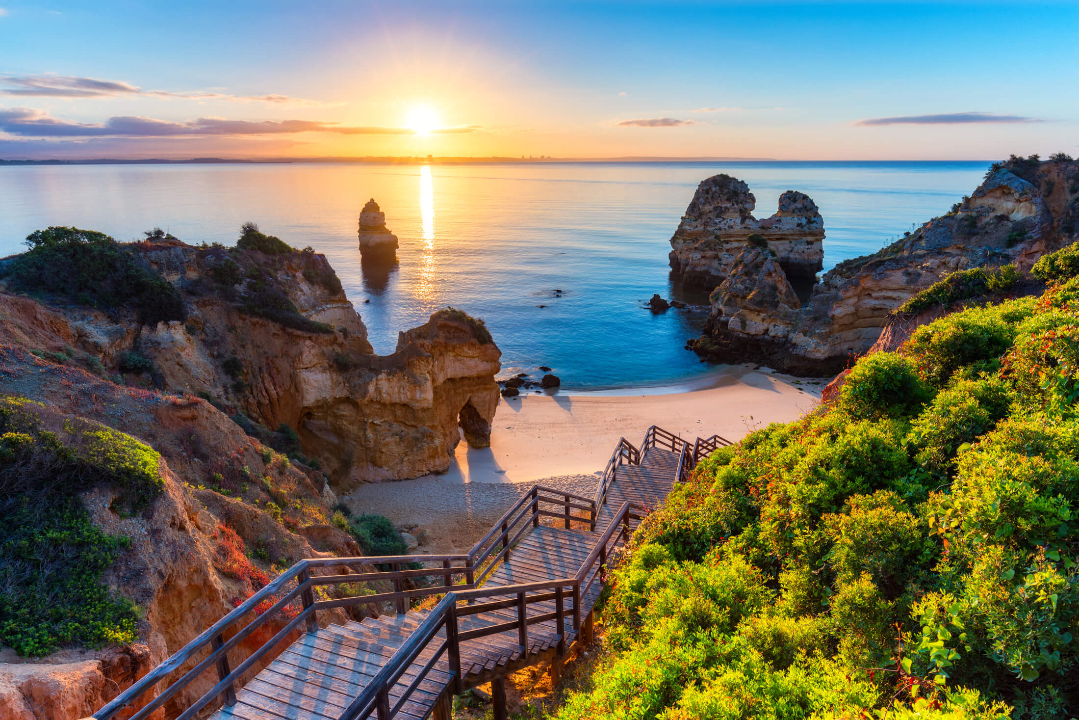 Steps leading down to a hidden beach on Portugal's Algarve coast