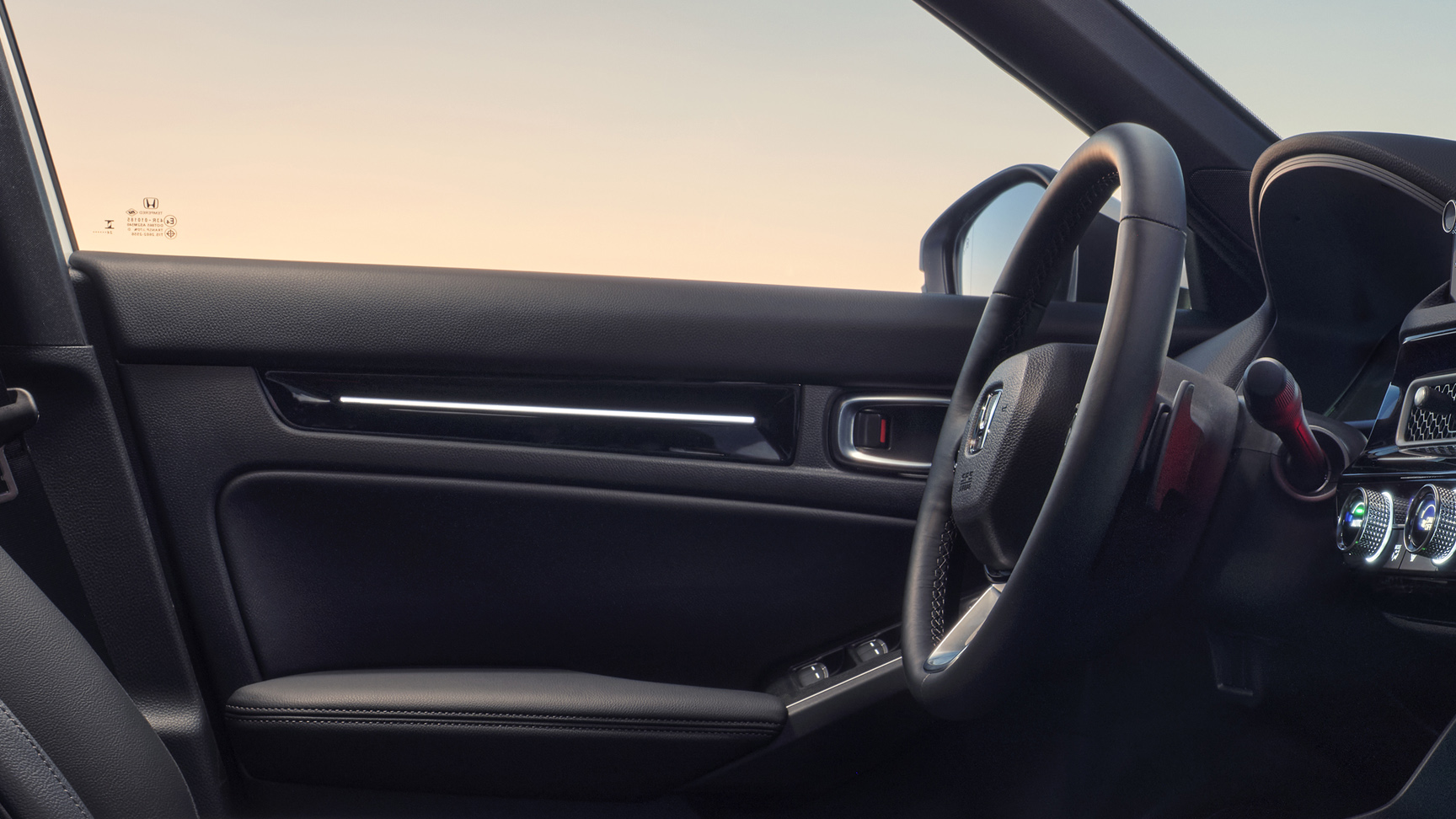 Interior of the Civic Hybrid, focusing on the ambient lighting panel.