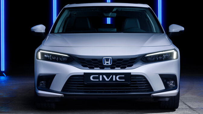 Close up of Honda Civic e:HEV badge on rear of the car.