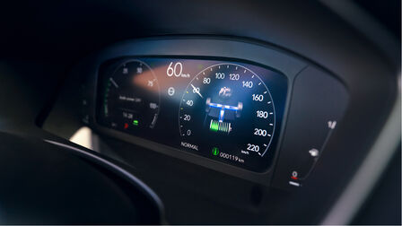 Close up of the Honda Civic e:HEV 10.2 digital display.