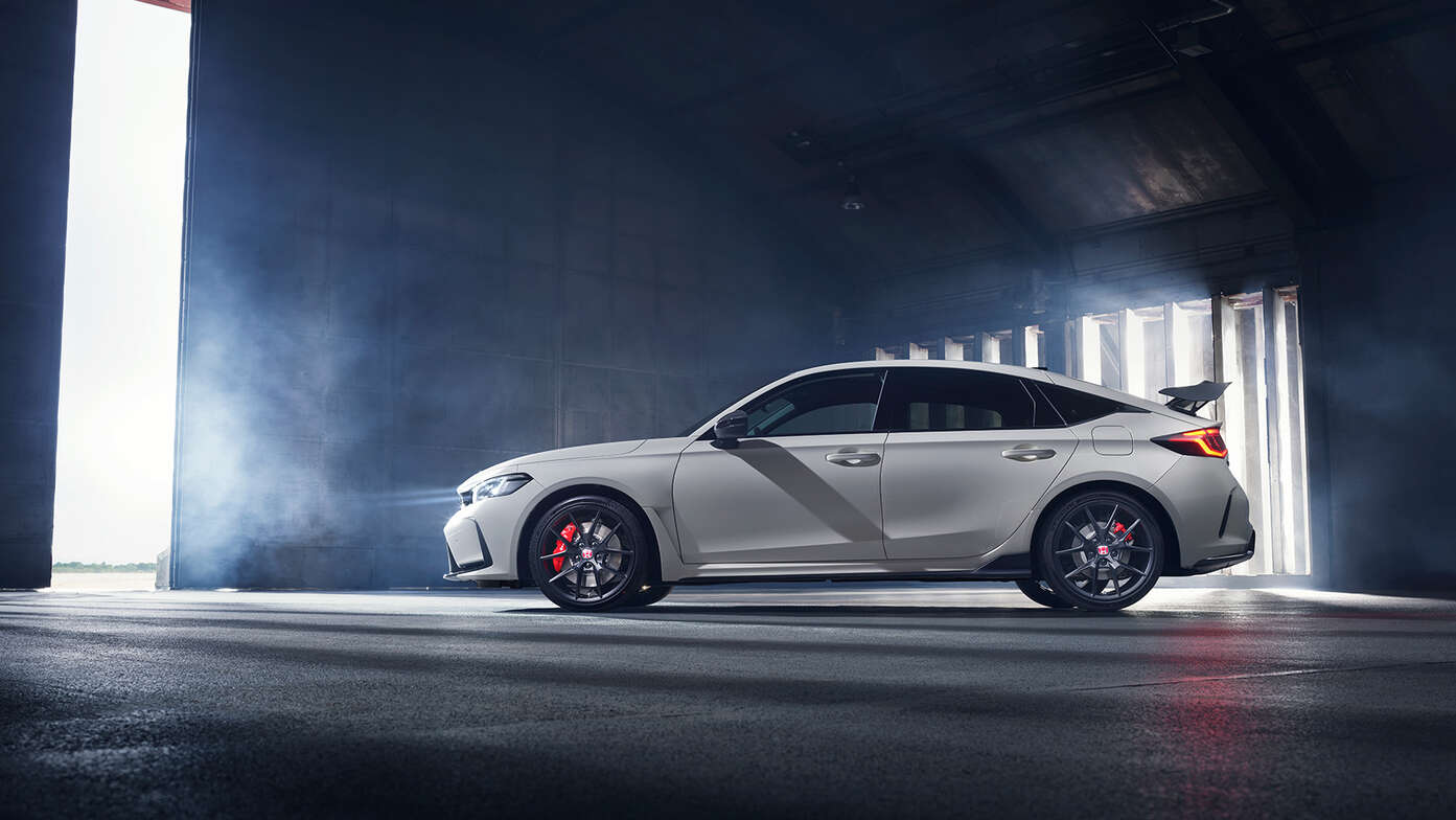 Side facing Honda Civic Type R in a tunnel.