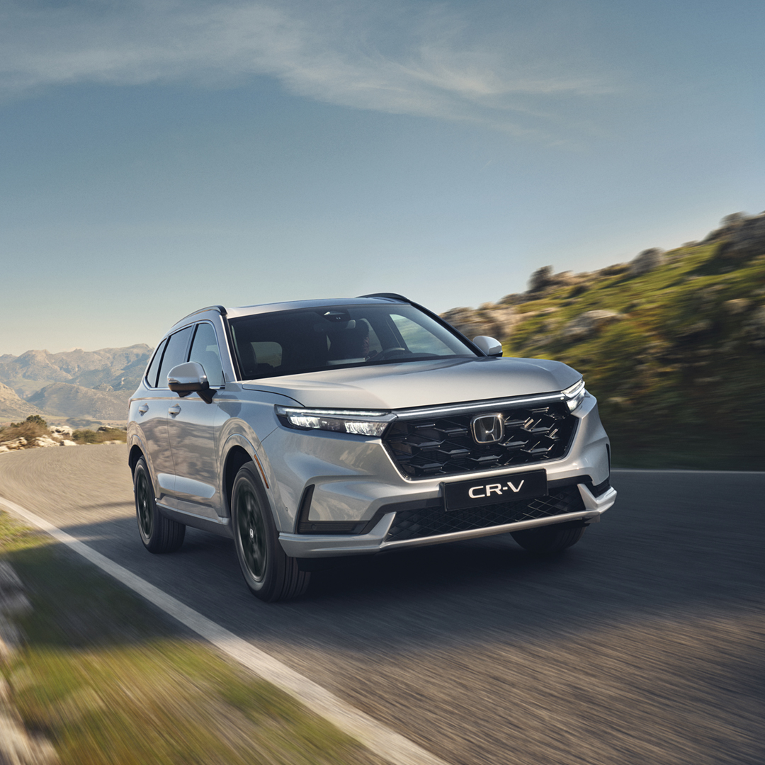 White CR-V showing plugin area