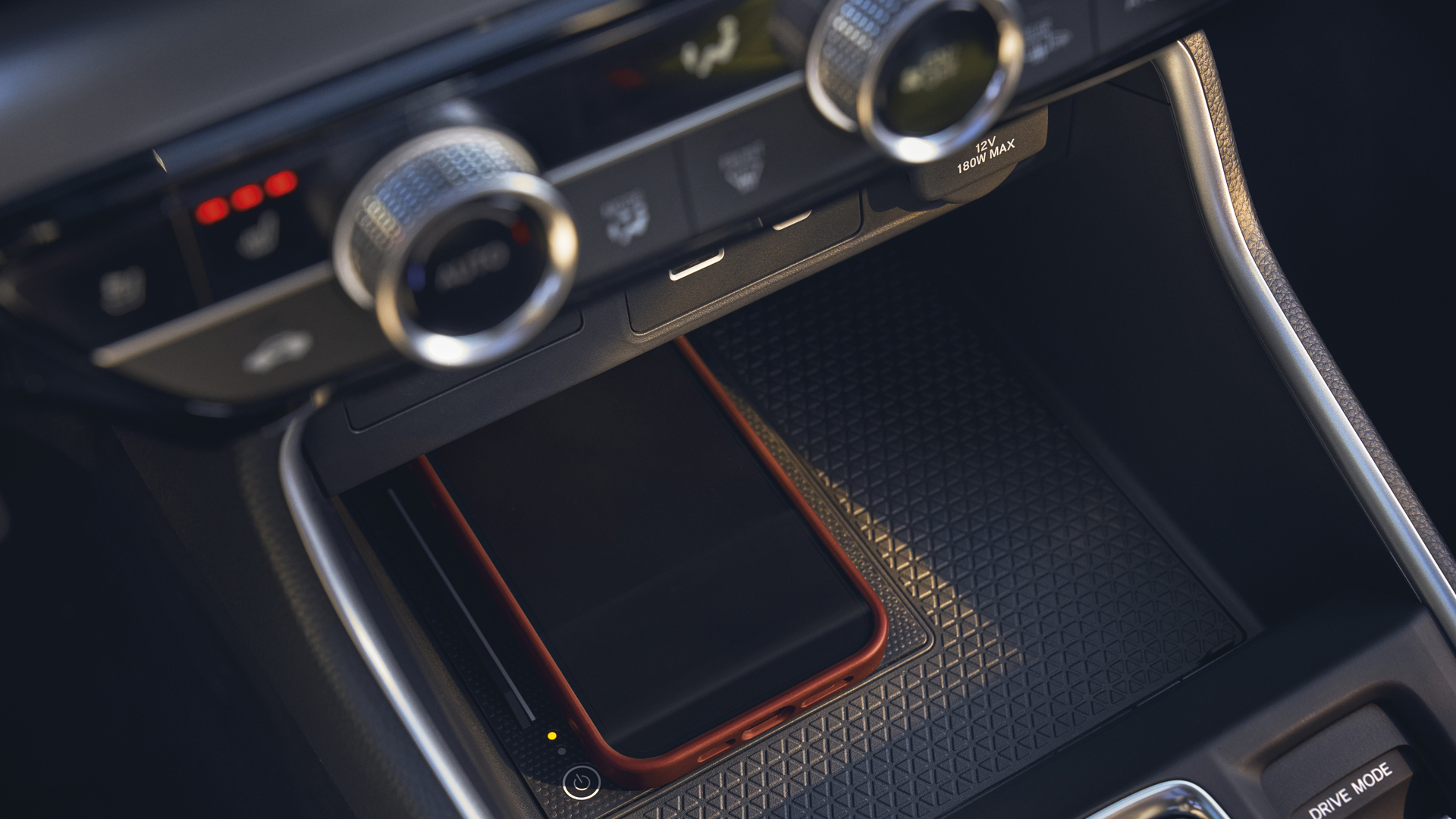 Close up of Honda CR-V Hybrid wireless charging technology.