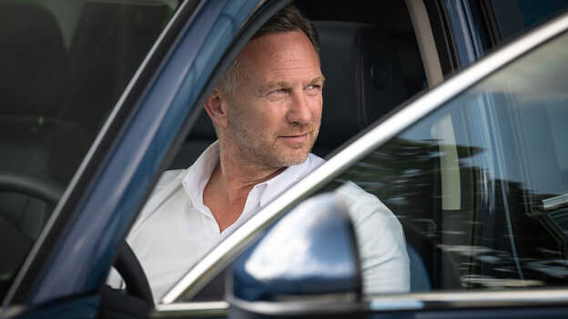 Christian Horner inside a Honda Hrybrid SUV