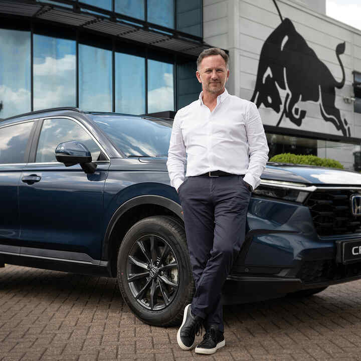 Christian Horner standing beside a Honda-CRV-EHEV