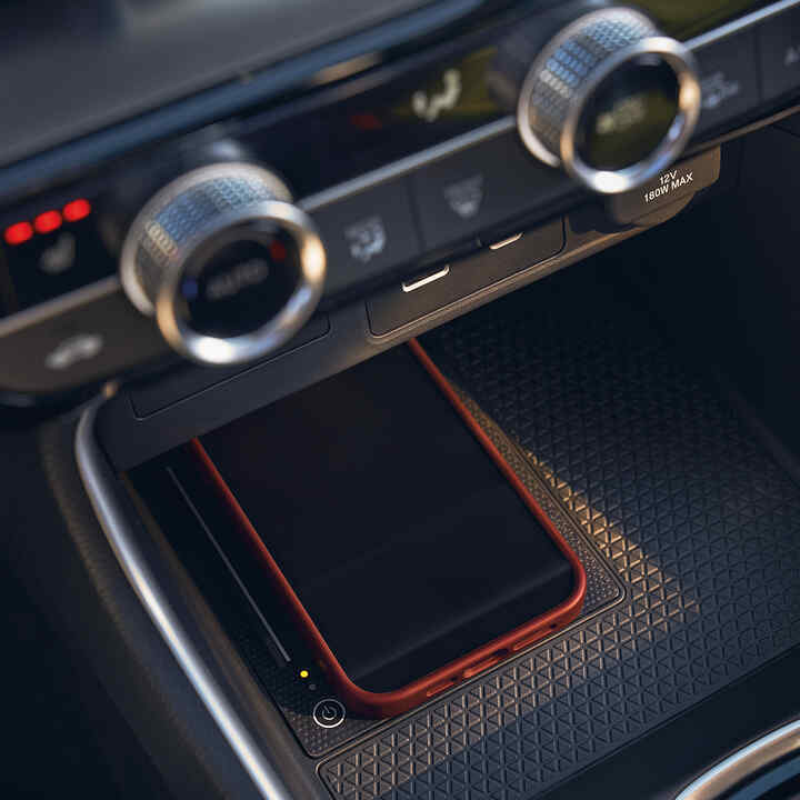 Close up of Honda CR-V Hybrid wireless charging technology.