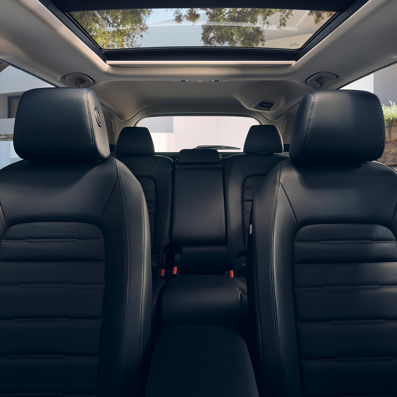 CR-V Hybrid SUV close up of interior heated front and rear leather seats.