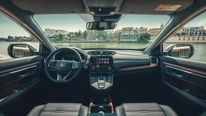 Interior Dashboard Close up of Honda CR-V Hybrid facing street location.