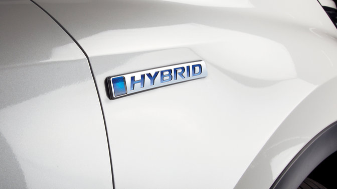 Side view close up or Honda CR-V Hybrid logo.