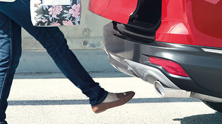 Side View Honda CR-V Hybrid hands free boot technology.