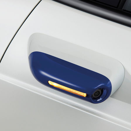 Close up of Honda e side view mirror.