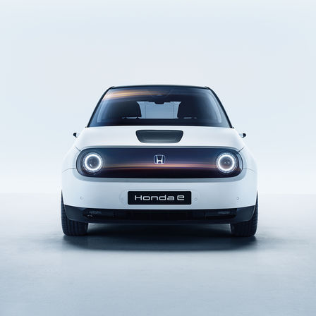 Front three-quarter facing Honda E, close up.