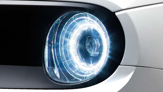 Close up of the Honde e LED headlights.