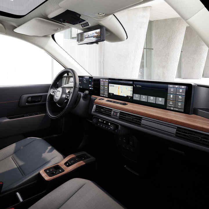 View of the interior from the passengers side of the Honda e.