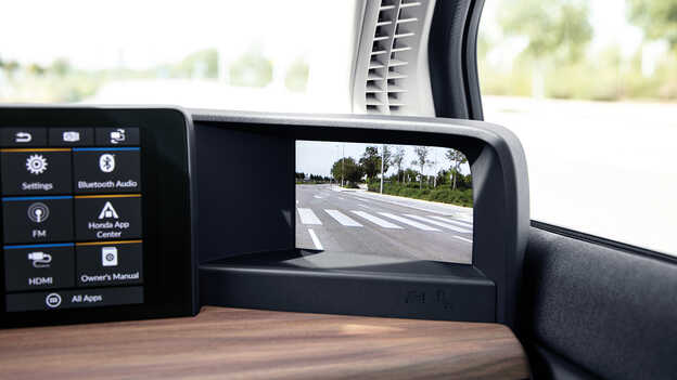 Close up of the Honda e digital dashboard.