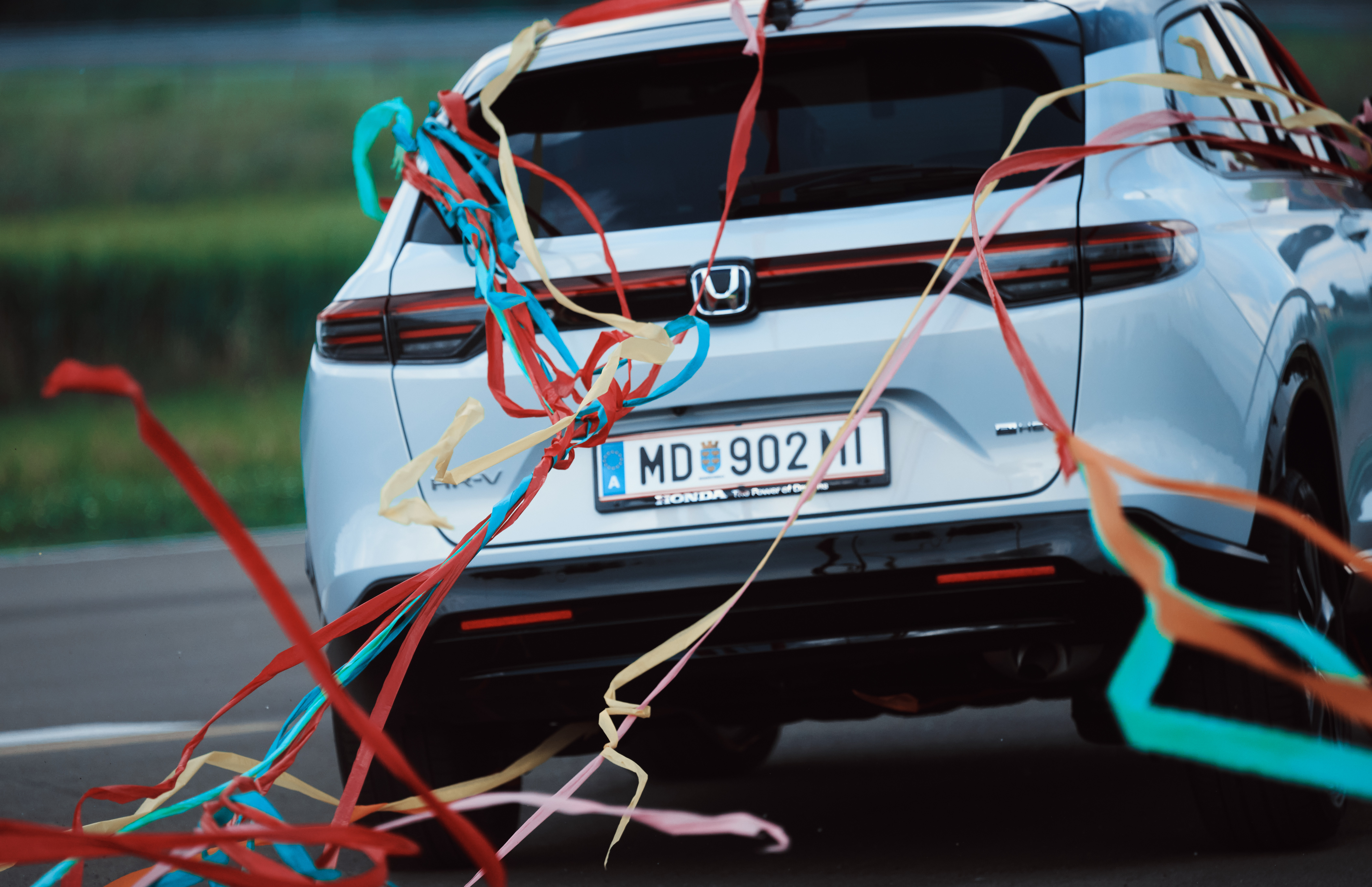 Back of HR-V shown closely with strips of confetti hanging