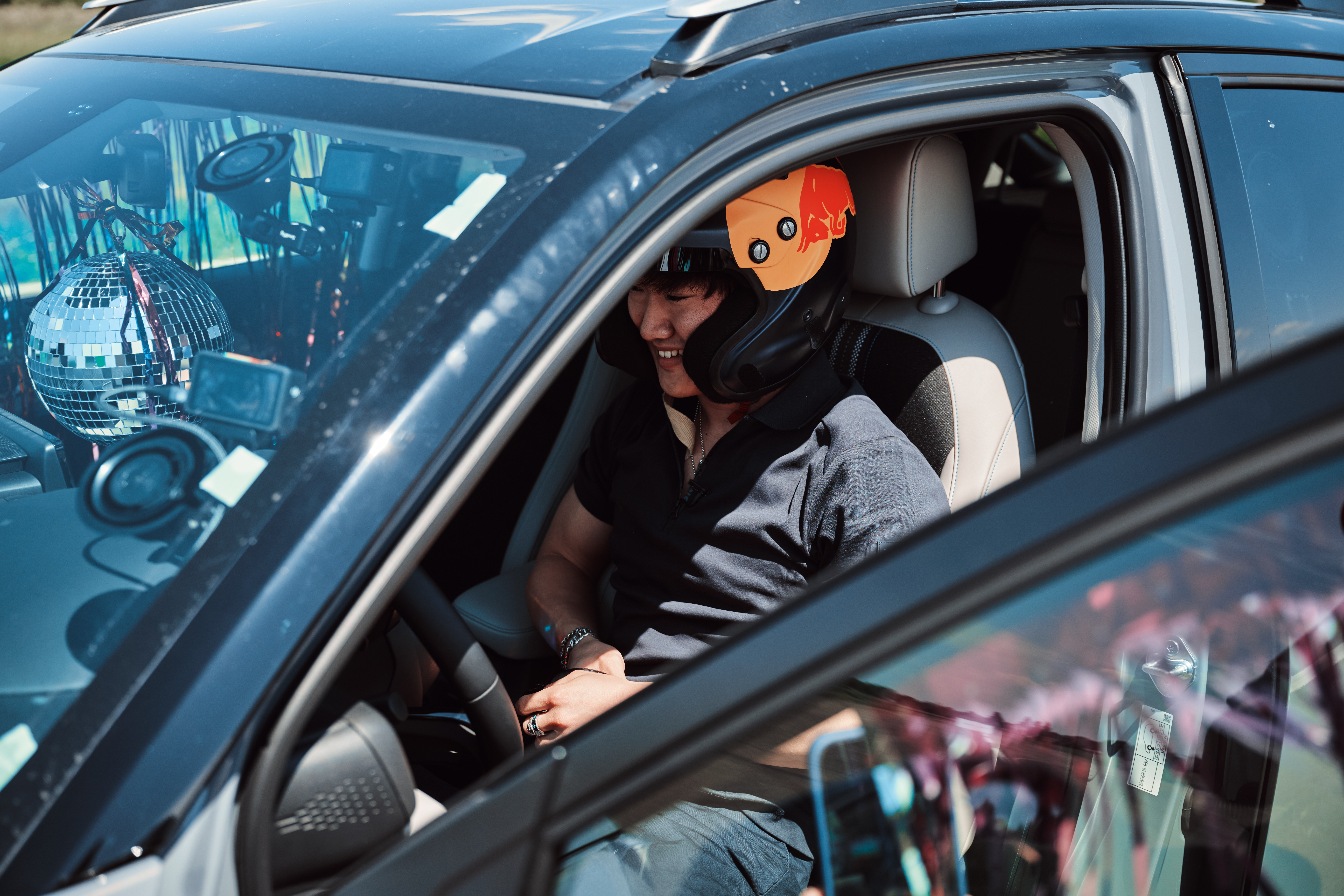 Yuki shown closely sitting in the HR-V