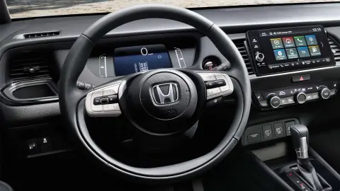 Close up of Honda Jazz Hybrid steering wheel.