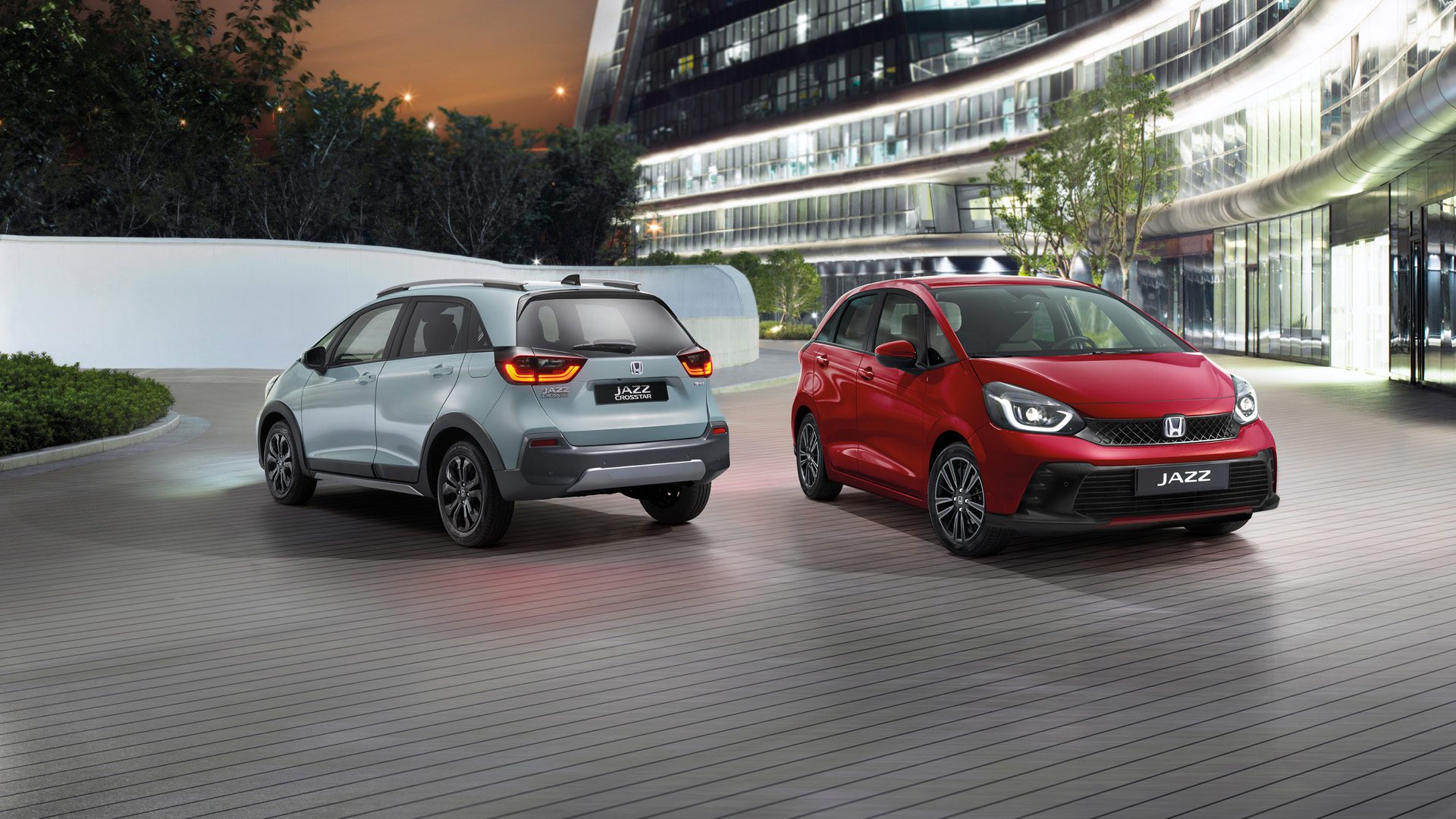 A Honda Jazz Hybrid and a Honda Jazz Crosstar parked next to each other.