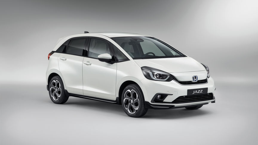 Front three-quarter facing Honda Jazz Hybrid with Style Plus pack.