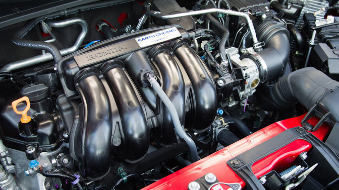 Close up of Honda engine.