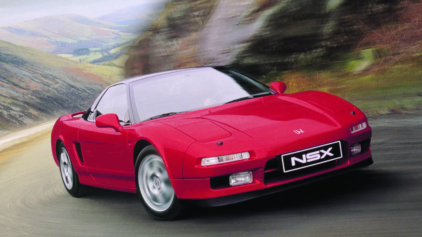 Front three-quarter facing Honda NSX, mountain location.