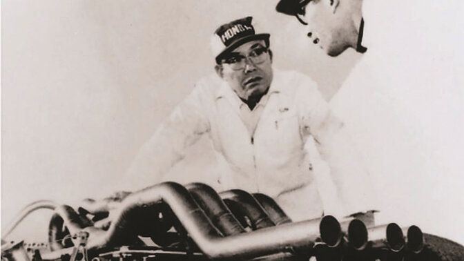 Soichiro Honda working on a racing car.