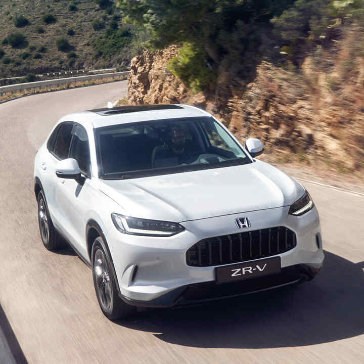 White ZR-V on a mountain road