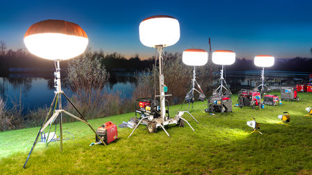 portable power generators being used to power studio lights outside