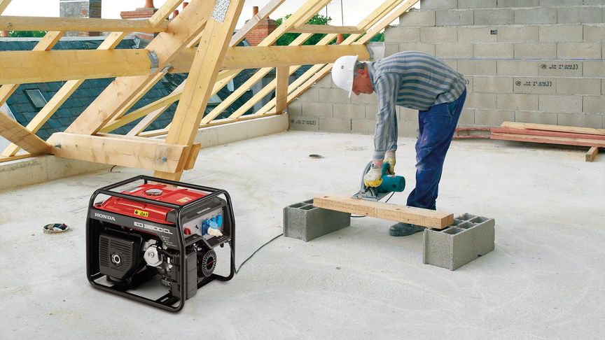 specialist open frame ec power generator being used on construction site by a worker