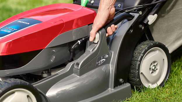 Central cutting height adjustment 
