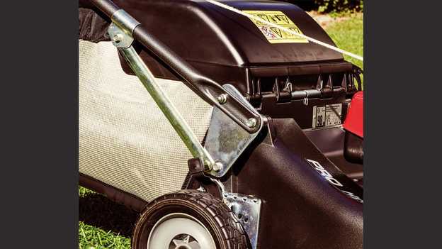 Honda HRD lawnmower close up of the large grass bag in garden location.