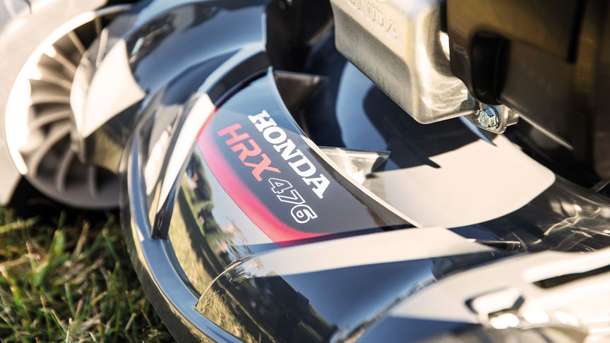 Honda HRX lawnmower cutting deck close up.