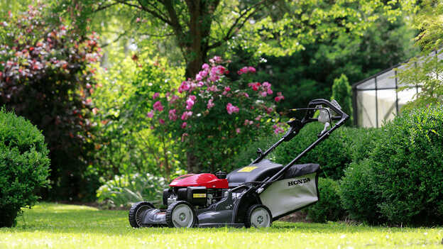  Side view of the Honda HRX with large grass bag.