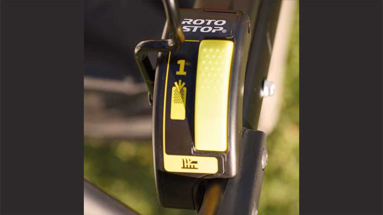 close up of honda petrol lawnmower roto stop blade brake